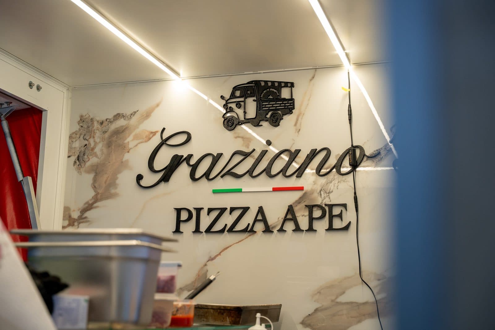 Das Graziano's Pizza Ape Logo in der Ape